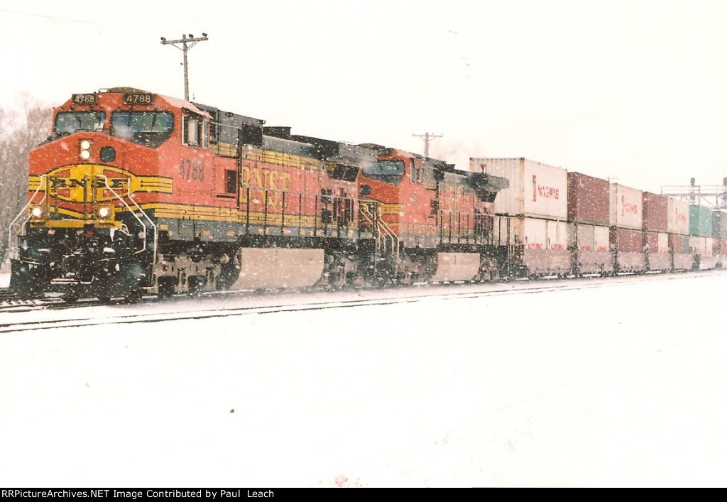 Westbound stacker dashes through the snow